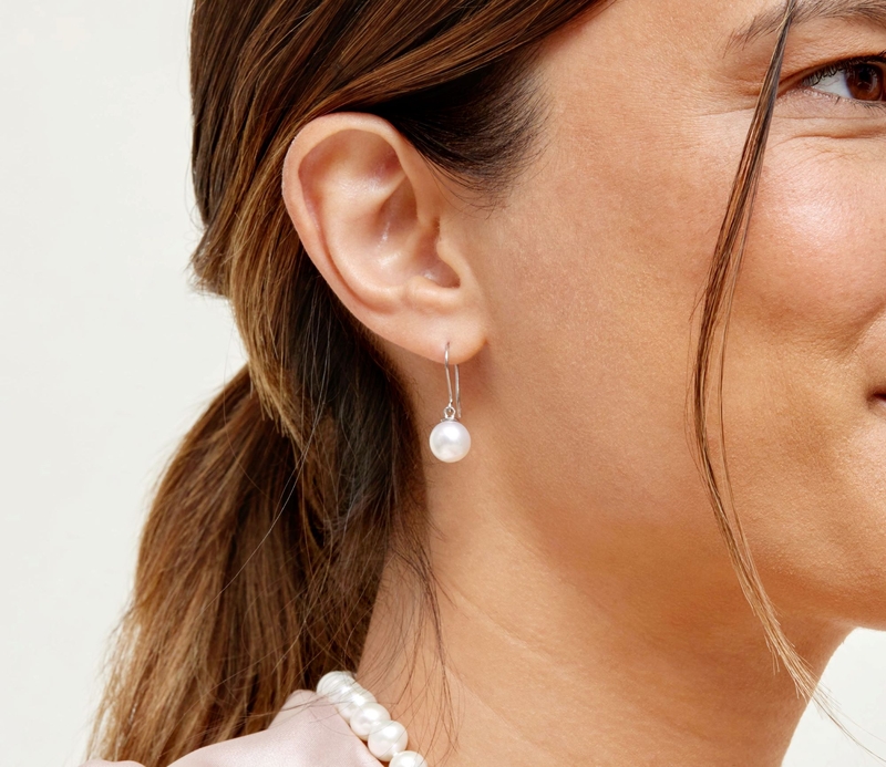 Model is wearing Linda earrings with 9-10mm AAAA quality pearls